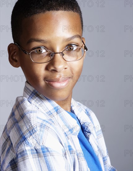 Mixed race boy smiling