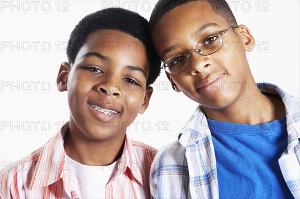 Mixed race boys smiling