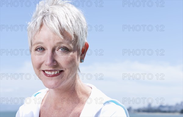 Senior Caucasian woman smiling outdoors