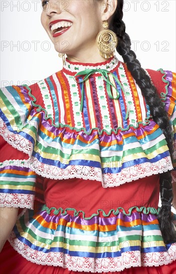 Hispanic woman wearing traditional clothing
