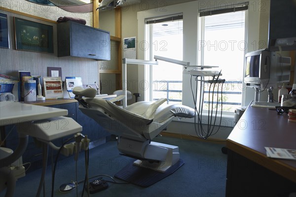 Chair and counters in empty dentist's office