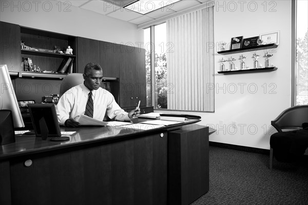 African American businessman working at desk