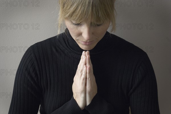 Close up of woman praying