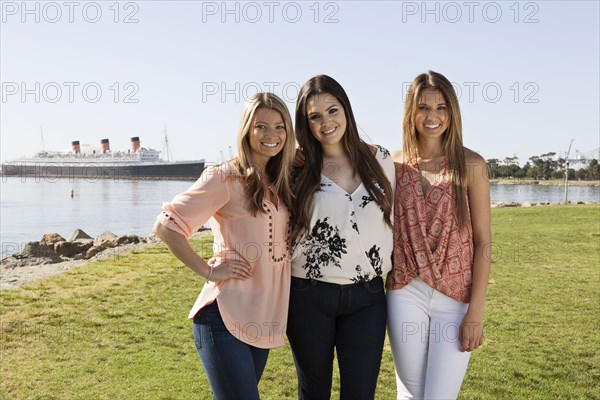 Caucasian women smiling in park