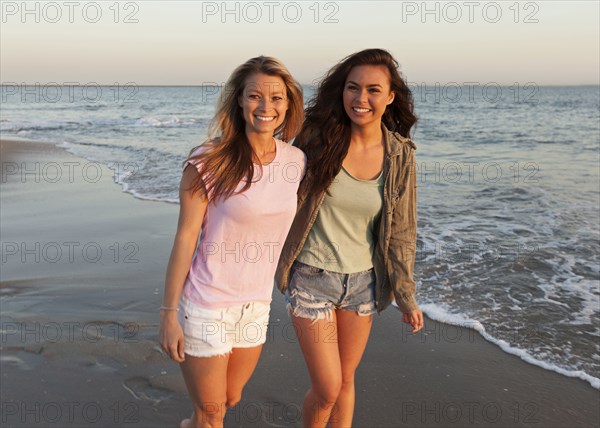 Women walking on beach