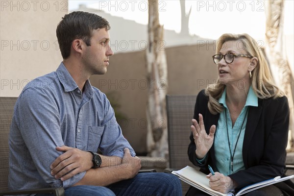 Man talking with therapist in therapy
