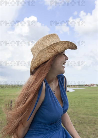 Caucasian woman in rural pasture