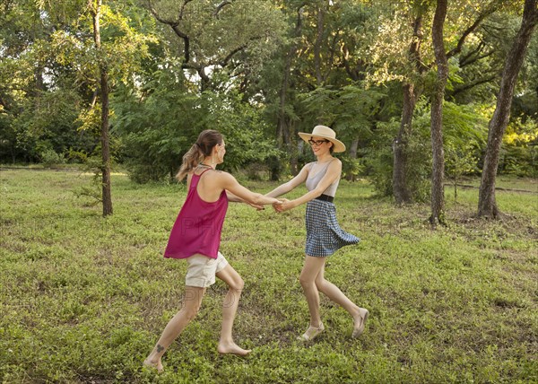 Caucasian women playing in park