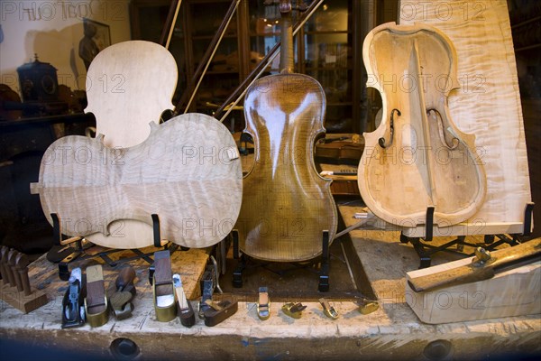 Violin and parts in violin workshop