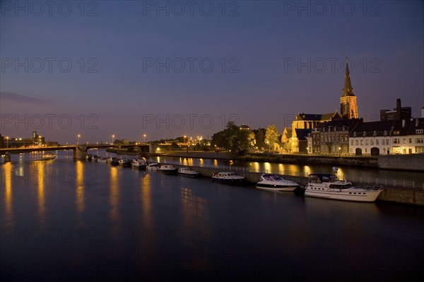 Dutch canal and boats at night