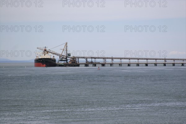 Container ship moored on dock