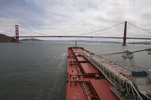 Golden Gate Bridge and freight ship
