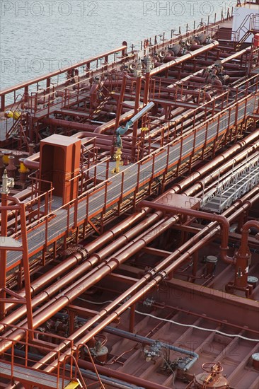 High angle view of deck piping on oil tanker ship