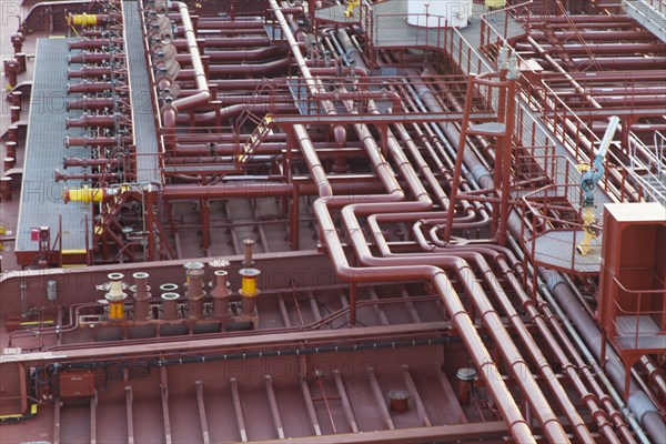 High angle view of deck piping on oil tanker ship