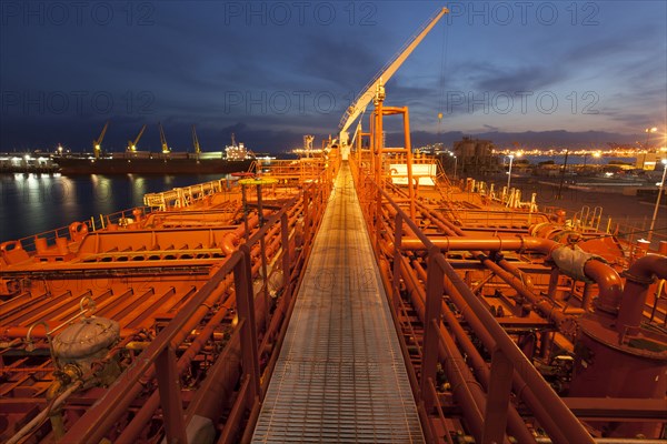 High angle view of deck piping on oil tanker ship