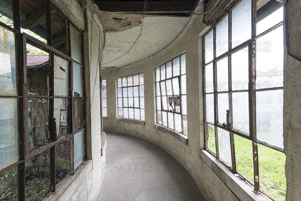 Curving walkway in dilapidated building