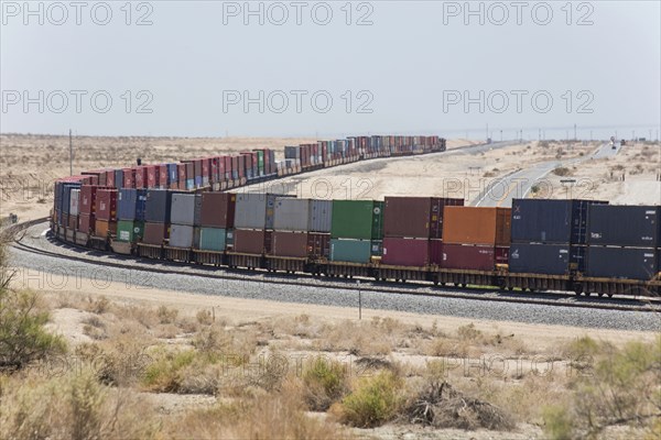 Cargo containers on curving railroad track