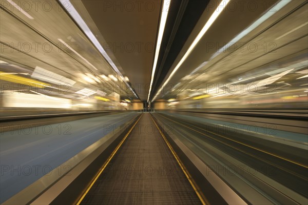 Blurred motion of moving walkway