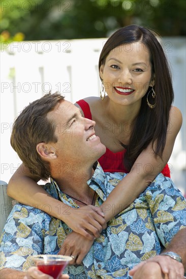 Couple relaxing together outdoors