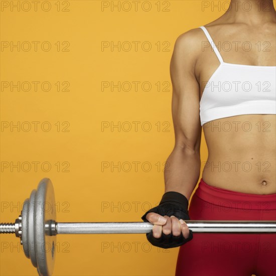 African woman lifting weights