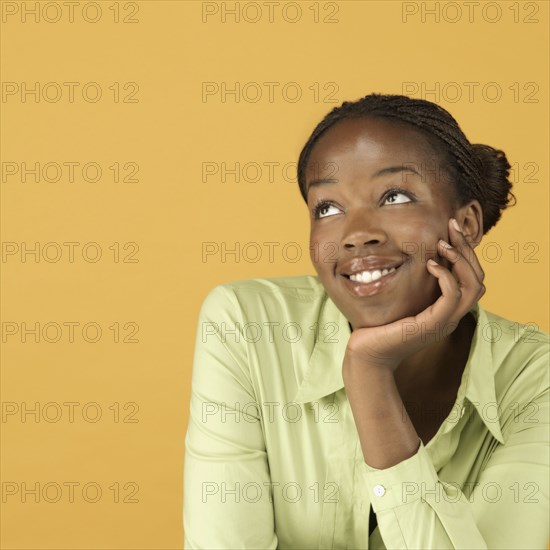 Studio shot of African woman smiling