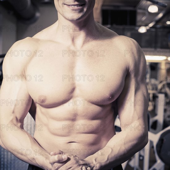 Close up of Caucasian man's muscular torso