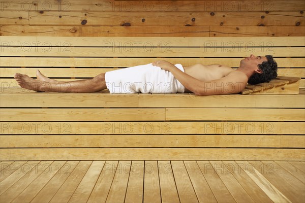 Man relaxing in sauna