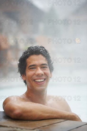 Man sitting in hot tub