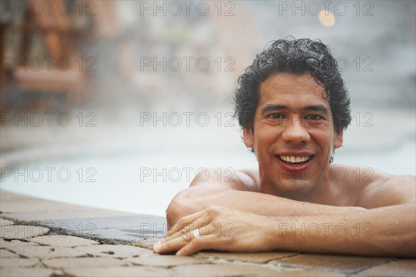 Man sitting in hot tub