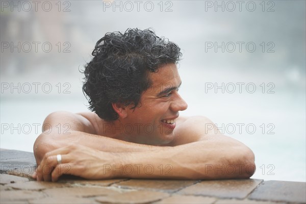 Man sitting in hot tub