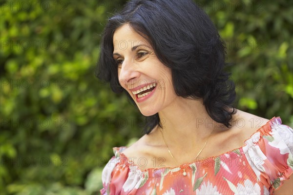 Confident Middle Eastern woman smiling