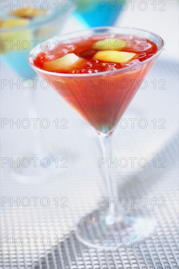 Close up of exotic cocktail in martini glass