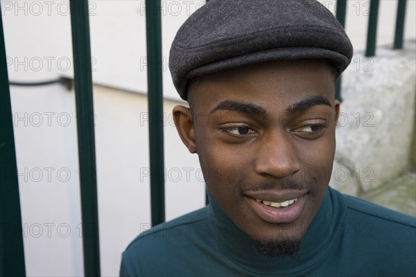 Close up of face of curious Black man
