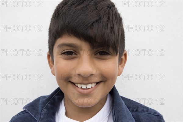 Close up of smiling Asian boy