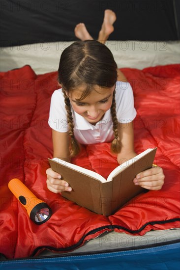 Hispanic girl reading