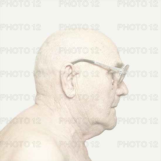 Older Caucasian man wearing glasses