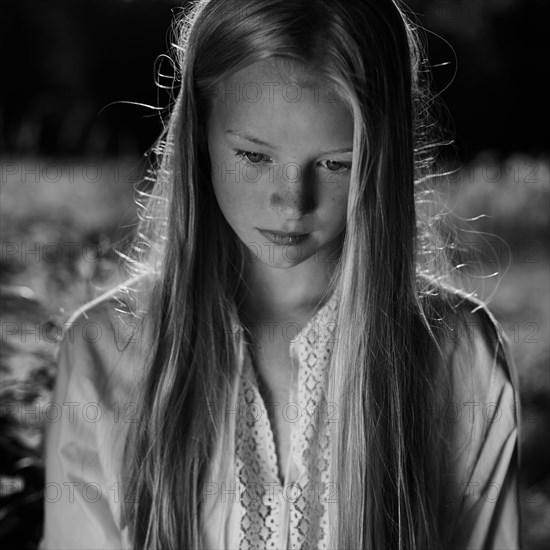 Caucasian girl looking down