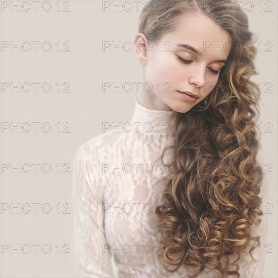 Calm Caucasian girl with long hair