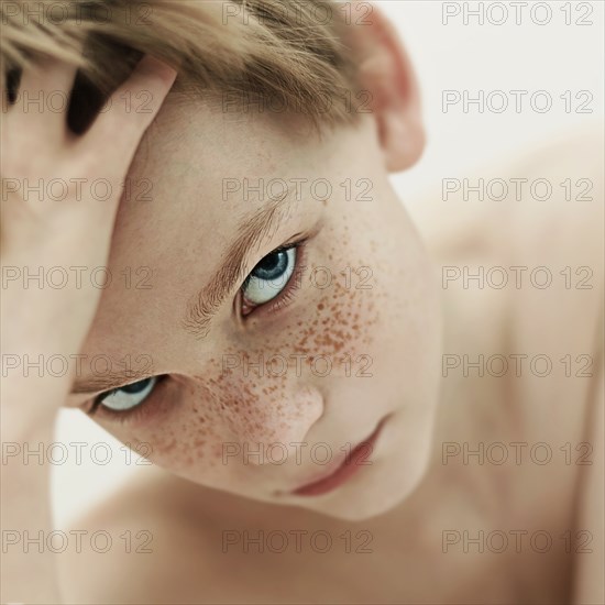 Close up of Caucasian boy's face