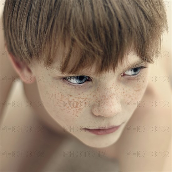 Close up of Caucasian boy's face