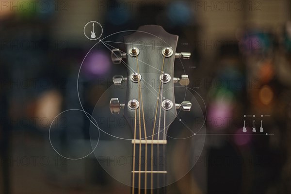 Close up of guitar overlaid with graphic design