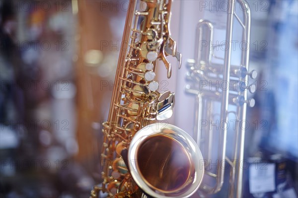 Close up of saxophone and trombone