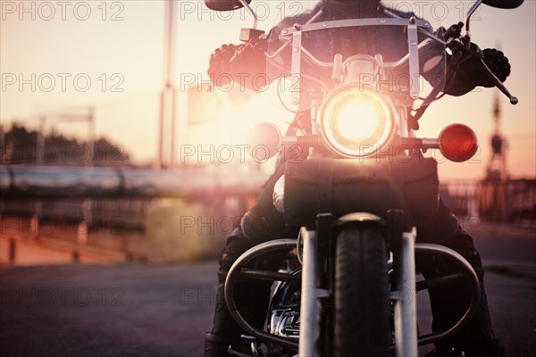 Caucasian man riding motorcycle