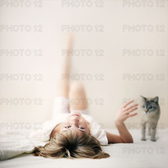 Caucasian girl laying on floor