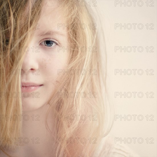 Caucasian teenage girl with messy hair