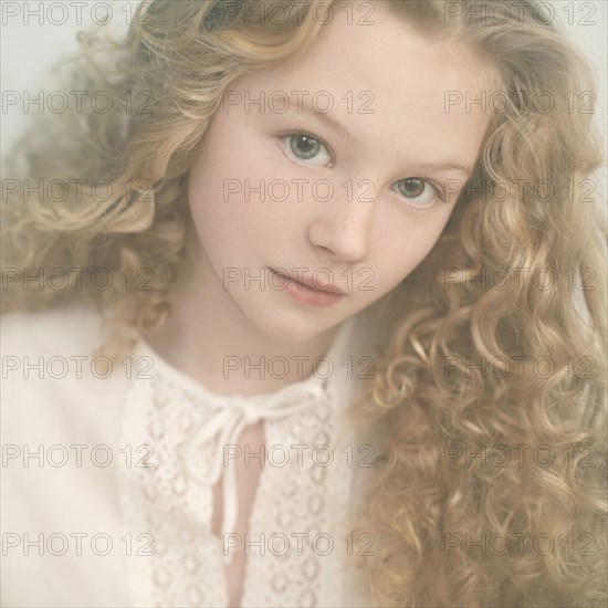 Caucasian teenage girl with curly hair