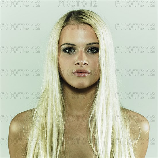 Caucasian woman with serious expression