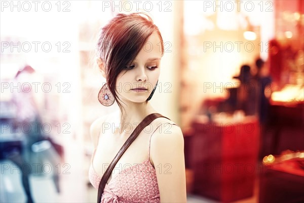 Caucasian woman standing in store