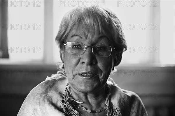 Older Caucasian woman wearing eyeglasses