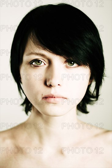 Caucasian teenage girl with serious expression